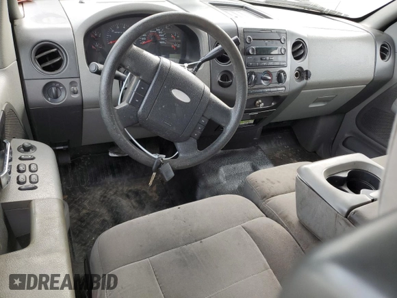 2007 Ford F-150 STX with VIN 1FTRX12WX7FB29557, listed as a Copart auction lot 48022365 with 237,643 mi miles and Salvage Title. Bid and sale history available at DreamBid. Image 8.