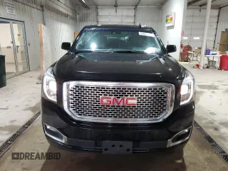 2015 GMC Yukon SLE with VIN 1GKS2AKC3FR664740, listed as a Copart auction lot 53824145 with 194,655 mi miles and Salvage Title. Bid and sale history available at carsss.com. Image 5.