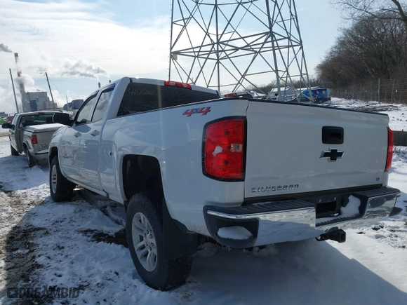 2018 Chevrolet Silverado 1500 LT with VIN 1GCVKREC7JZ173079, listed as a IAAI auction lot 41602728 with 147,685 mi miles. Bid and sale history available at carsss.com. Image 3.