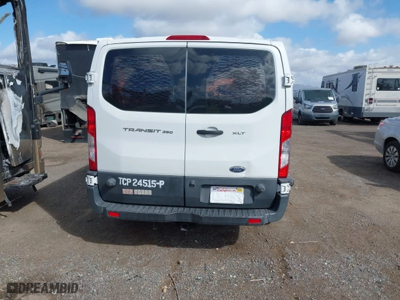 2016 Ford Transit Wagon XL with VIN 1FBZX2ZM5GKB32047, listed as a IAAI auction lot 41710159 with 321,489 mi miles. Bid and sale history available at carsss.com. Image 16.