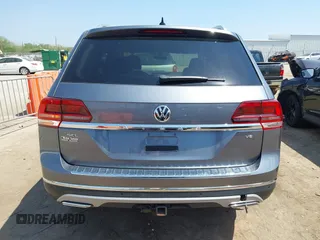 2019 Volkswagen Atlas SEL z VIN 1V2ER2CA5KC555568, wystawiony jako IAAI lot #42050516 z przebiegiem 71 599 mil mil oraz . Historia ofert i sprzedaży dostępna na DreamBid. Obrazek 16.