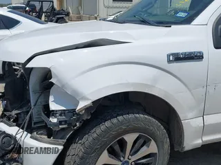 2020 Ford F-150 XL with VIN 1FTEW1EPXLKD73295, listed as a IAAI auction lot 42201266 with 69,628 mi miles and . Bid and sale history available at DreamBid. Image 6.