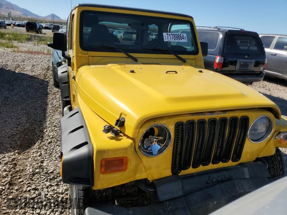 2002 Jeep Wrangler X with VIN 1J4FA39S42P725876, listed as a Copart auction lot 71789864 with 154,991 mi miles and Salvage Title. Bid and sale history available at carsss.com. Image 5.