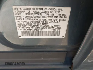 2005 Honda Pilot EX with VIN 2HKYF184X5H539427, listed as a IAAI auction lot 42004991 with 173,623 mi miles. Bid and sale history available at carsss.com. Image 9.