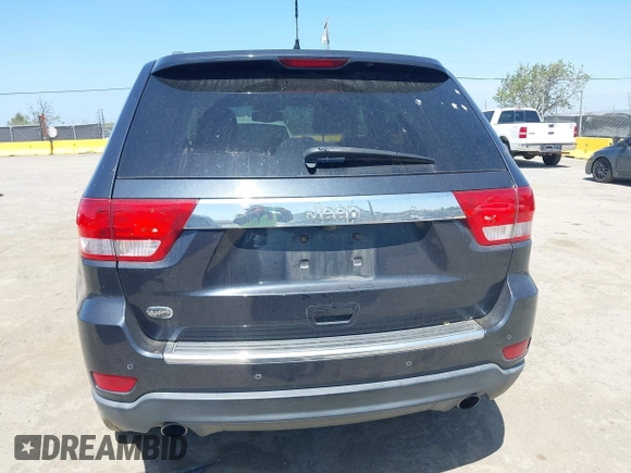 2013 Jeep Grand Cherokee Overland with VIN 1C4RJECT8DC534021, listed as a IAAI auction lot 42058374 with 137,289 mi miles. Bid and sale history available at carsss.com. Image 16.