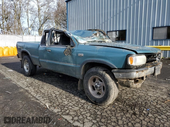 1994 Mazda B-Series Truck LE z VIN 4F4DR17X5RTN10704, wystawiony jako Copart lot #87230804 z przebiegiem 227 476 mil mil oraz Szkoda całkowita • Salvage title. Historia ofert i sprzedaży dostępna na DreamBid. Obrazek 4.