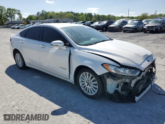 2013 Ford Fusion SE Hybrid with VIN 3FA6P0LU1DR358983, listed as a Copart auction lot 51907665 with 143,459 mi miles and Salvage Title. Bid and sale history available at DreamBid. Image 4.