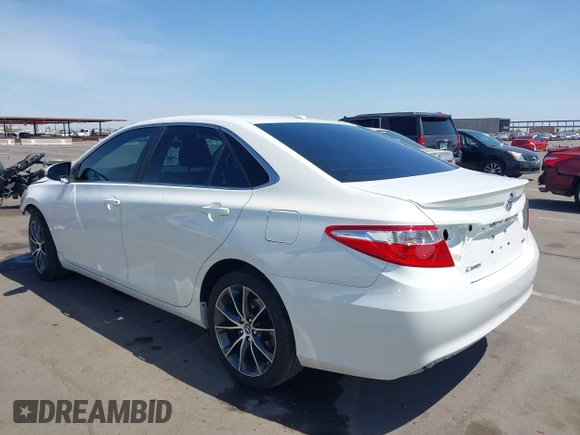 2015 Toyota Camry XLE with VIN 4T1BF1FK4FU477825, listed as a IAAI auction lot 41988429 with 156,886 mi miles and . Bid and sale history available at DreamBid. Image 3.