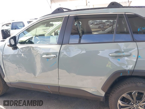 2023 Toyota RAV4 Hybrid XLE Premium with VIN JTMB6RFV8PD086983, listed as a IAAI auction lot 41612674 with 70,817 mi miles. Bid and sale history available at carsss.com. Image 15.
