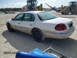 1998 Lincoln Continental with VIN 1LNFM97V5WY637895, listed as a Copart auction lot 77020154 with 0 mi miles and Salvage Title. Bid and sale history available at carsss.com. Image 2.