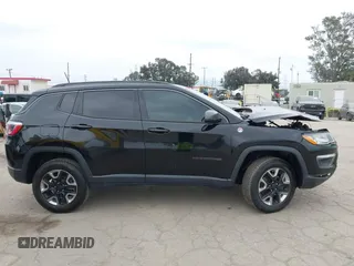 2018 Jeep Compass Trailhawk with VIN 3C4NJDDB3JT451658, listed as a IAAI auction lot 42087588 with 90,189 mi miles and . Bid and sale history available at DreamBid. Image 13.