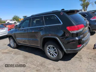 2018 Jeep Grand Cherokee Altitude with VIN 1C4RJFAG2JC148282, listed as a Copart auction lot 57315295 with 98,453 mi miles and Salvage title. Bid and sale history available at DreamBid. Image 2.