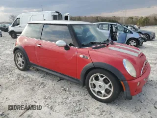 2006 MINI Hardtop S with VIN WMWRE33576TJ36468, listed as a Copart auction lot 47862595 with 123,797 mi miles and Salvage Title. Bid and sale history available at DreamBid. Image 4.