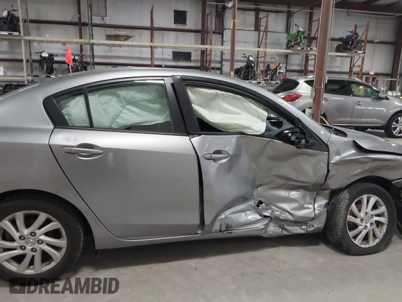 2012 Mazda 3 i Touring with VIN JM1BL1V77C1696219, listed as a IAAI auction lot 41944925 with 85,961 mi miles and . Bid and sale history available at DreamBid. Image 13.