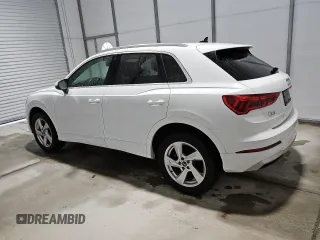 2021 Audi Q3 Premium with VIN WA1AUCF34M1090677, listed as a Copart auction lot 56111815 with 93,573 mi miles and Clean title. Bid and sale history available at DreamBid. Image 2.