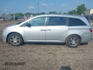 2012 Honda Odyssey EX-L with VIN 5FNRL5H65CB039015, listed as a IAAI auction lot 42612886 with 216,955 mi miles and . Bid and sale history available at DreamBid. Image 14.