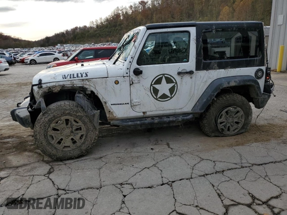 2017 Jeep Wrangler Willys Wheeler with VIN 1C4AJWAG7HL589574, listed as a Copart auction lot 79006504 with 117,075 mi miles and Salvage Title. Bid and sale history available at DreamBid. Image 1.