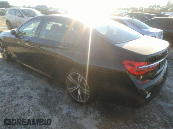2017 BMW 7 Series 750i with VIN WBA7F0C35HGM22087, listed as a IAAI auction lot 40872348 with 49,734 mi miles. Bid and sale history available at carsss.com. Image 3.
