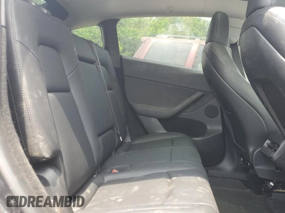 2024 Tesla Model Y Long Range z VIN 7SAYGDEE2RF986871, wystawiony jako Copart lot #60168535 z przebiegiem 15 647 mil mil oraz Szkoda całkowita • Salvage title. Historia ofert i sprzedaży dostępna na DreamBid. Obrazek 10.
