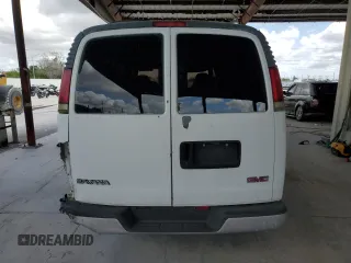 1998 GMC Savana z VIN 1GTEG15M7W1029632, wystawiony jako Copart lot #56106675 z przebiegiem Nie podano mil oraz Nie do naprawy. Historia ofert i sprzedaży dostępna na DreamBid. Obrazek 6.
