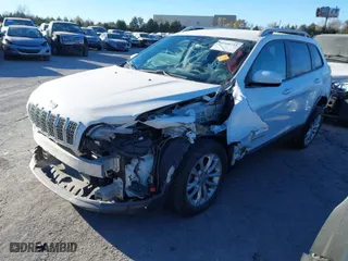 2020 Jeep Cherokee Latitude with VIN 1C4PJLCB2LD601353, listed as a IAAI auction lot 40908725 with 86,485 mi miles. Bid and sale history available at carsss.com. Image 2.