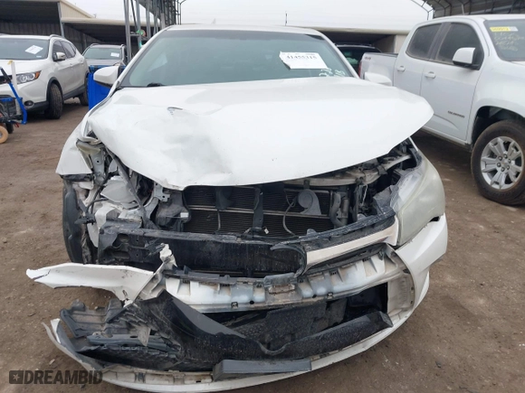 2015 Toyota Camry Hybrid LE with VIN 4T1BD1FK0FU175597, listed as a IAAI auction lot 41455315 with 116,380 mi miles. Bid and sale history available at carsss.com. Image 12.