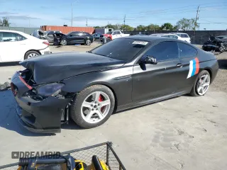 2012 BMW 6 Series 650i xDrive with VIN WBALX5C59CC894335, listed as a Copart auction lot 87297754 with 84,508 mi miles and Salvage Title. Bid and sale history available at carsss.com. Image 1.