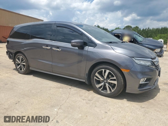 2018 Honda Odyssey Elite with VIN 5FNRL6H96JB015464, listed as a Copart auction lot 56911075 with 120,868 mi miles and Clean title. Bid and sale history available at DreamBid. Image 4.