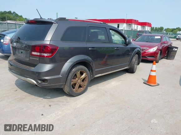 2017 Dodge Journey Crossroad Plus with VIN 3C4PDCGB5HT613080, listed as a IAAI auction lot 42425123 with 114,413 mi miles and . Bid and sale history available at DreamBid. Image 4.