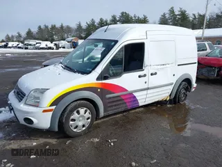 2011 Ford Transit Connect XLT z VIN NM0LS7DN2BT050418, wystawiony jako IAAI lot #41631356 z przebiegiem 154 095 mil mil oraz . Historia ofert i sprzedaży dostępna na DreamBid. Obrazek 2.