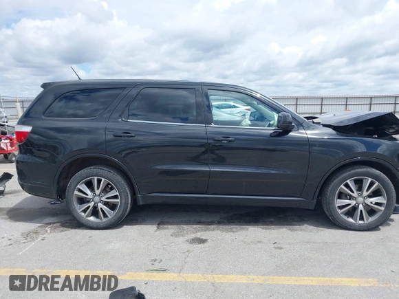 2013 Dodge Durango SXT with VIN 1C4RDJAG4DC697450, listed as a IAAI auction lot 42336657 with 177,476 mi miles and . Bid and sale history available at DreamBid. Image 13.