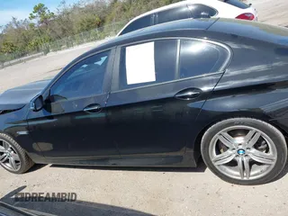 2014 BMW 5 Series 535d with VIN WBAXA5C58ED690447, listed as a IAAI auction lot 41577468 with 149,080 mi miles and . Bid and sale history available at carsss.com. Image 15.