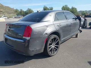 2016 Chrysler 300 with VIN 2C3CCAEG3GH324716, listed as a IAAI auction lot 41776116 with 134,978 mi miles. Bid and sale history available at carsss.com. Image 4.