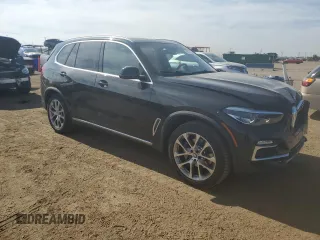 2020 BMW X5 xDrive40i with VIN 5UXCR6C08LLL83222, listed as a Copart auction lot 58377955 with 38,854 mi miles and Salvage title. Bid and sale history available at DreamBid. Image 4.
