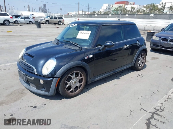 2006 MINI Hardtop S with VIN WMWRE33596TJ35502, listed as a IAAI auction lot 42474204 with 126,938 mi miles and . Bid and sale history available at DreamBid. Image 2.