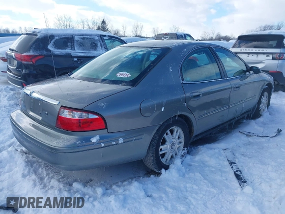 2004 Mercury Sable LS Premium with VIN 1MEFM55S04A619587, listed as a IAAI auction lot 41571950 with 125,444 mi miles and . Bid and sale history available at DreamBid. Image 4.