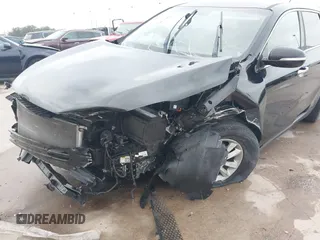 2020 Kia Sorento LX with VIN 5XYPG4A35LG642383, listed as a IAAI auction lot 41232335 with 61,802 mi miles. Bid and sale history available at carsss.com. Image 6.