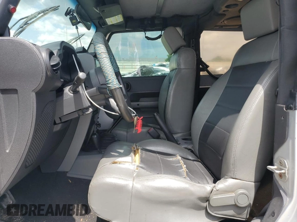 2008 Jeep Wrangler X with VIN 1J4FA24168L549082, listed as a Copart auction lot 58178805 with 150,606 mi miles and Salvage title. Bid and sale history available at DreamBid. Image 7.