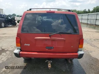 1999 Jeep Cherokee Sport with VIN 1J4FT68SXXL669549, listed as a Copart auction lot 62367015 with 194,446 mi miles and Salvage title. Bid and sale history available at DreamBid. Image 6.