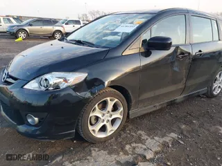 2010 Mazda Mazda5 Sport with VIN JM1CR2W3XA0385634, listed as a IAAI auction lot 41381553 with 128,726 mi miles. Bid and sale history available at carsss.com. Image 6.