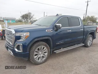 2022 GMC Sierra 1500 Limited Denali with VIN 3GTU9FEL9NG178943, listed as a IAAI auction lot 40994350 with 40,990 mi miles. Bid and sale history available at carsss.com. Image 2.