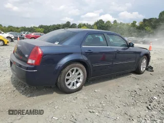 2005 Chrysler 300 with VIN 2C3AA53G05H589338, listed as a Copart auction lot 69333264 with 153,488 mi miles and Salvage Title. Bid and sale history available at carsss.com. Image 3.