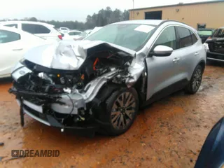 2020 Ford Escape Titanium Hybrid with VIN 1FMCU0DZ8LUB13911, listed as a IAAI auction lot 41249498 with 64,108 mi miles and . Bid and sale history available at DreamBid. Image 17.