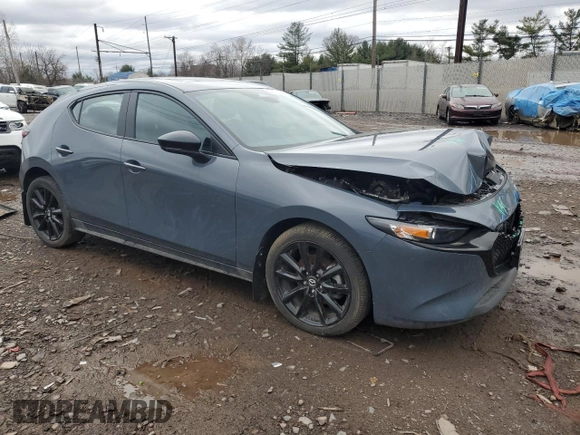 2024 Mazda 3 S Carbon Edition with VIN JM1BPBLM7R1656105, listed as a Copart auction lot 49141345 with 20,596 mi miles and Salvage title. Bid and sale history available at DreamBid. Image 4.