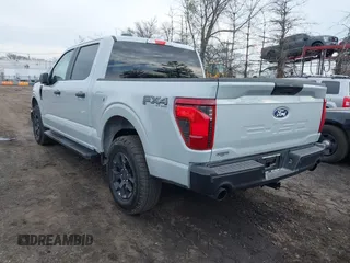 2024 Ford F-150 STX with VIN 1FTEW2LP1RFC11484, listed as a IAAI auction lot 41661056 with 2,128 mi miles and . Bid and sale history available at carsss.com. Image 3.