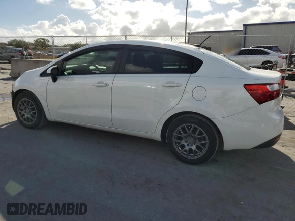2014 Kia Rio LX with VIN KNADM4A35E6346018, listed as a Copart auction lot 85544104 with 76,455 mi miles and Salvage Title. Bid and sale history available at carsss.com. Image 2.