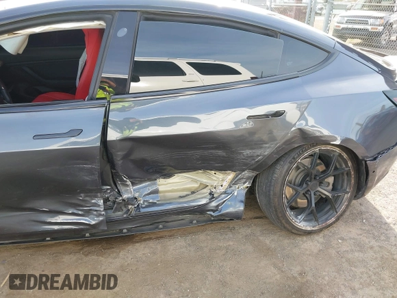 2019 Tesla Model 3 Long Range with VIN 5YJ3E1EB6KF413320, listed as a IAAI auction lot 41760428 with 90,441 mi miles and . Bid and sale history available at DreamBid. Image 6.