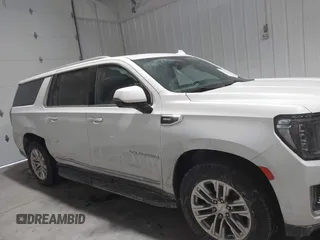 2021 GMC Yukon XL SLT with VIN 1GKS2GKD4MR414318, listed as a IAAI auction lot 41590618 with 49,913 mi miles. Bid and sale history available at carsss.com. Image 13.
