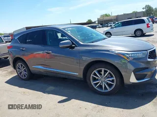 2020 Acura RDX Technology with VIN 5J8TC2H53LL014852, listed as a IAAI auction lot 39360410 with 61,341 mi miles and . Bid and sale history available at DreamBid. Image 13.