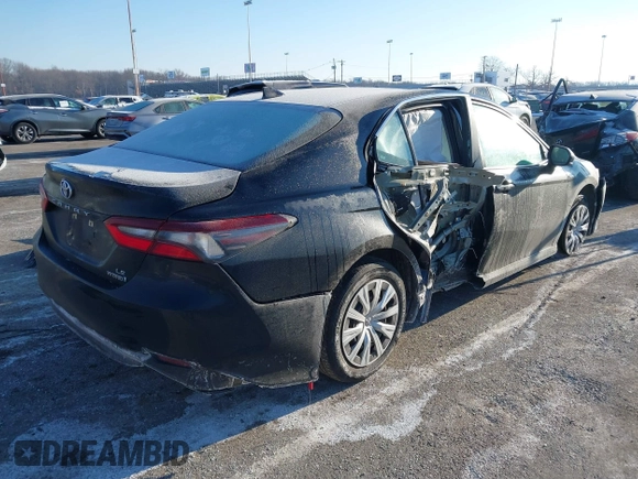 2021 Toyota Camry Hybrid LE with VIN 4T1C31AK6MU554826, listed as a IAAI auction lot 41413617 with 168,787 mi miles. Bid and sale history available at carsss.com. Image 4.